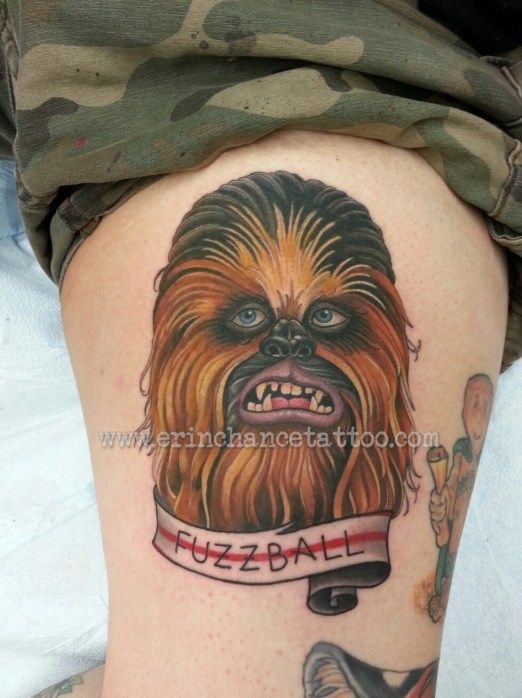 Fuzzball Banner And Chewbacca Tattoo On Thigh