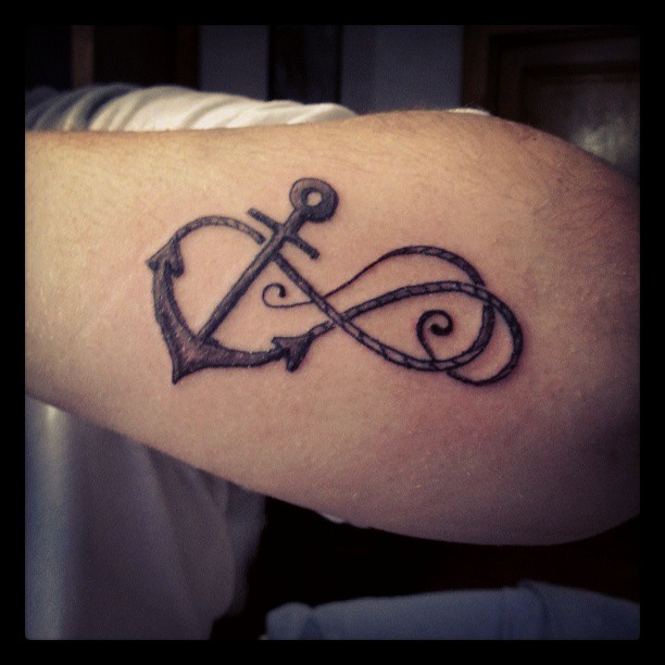 Grey Ink Rope Anchor Infinity Tattoo On Left Arm