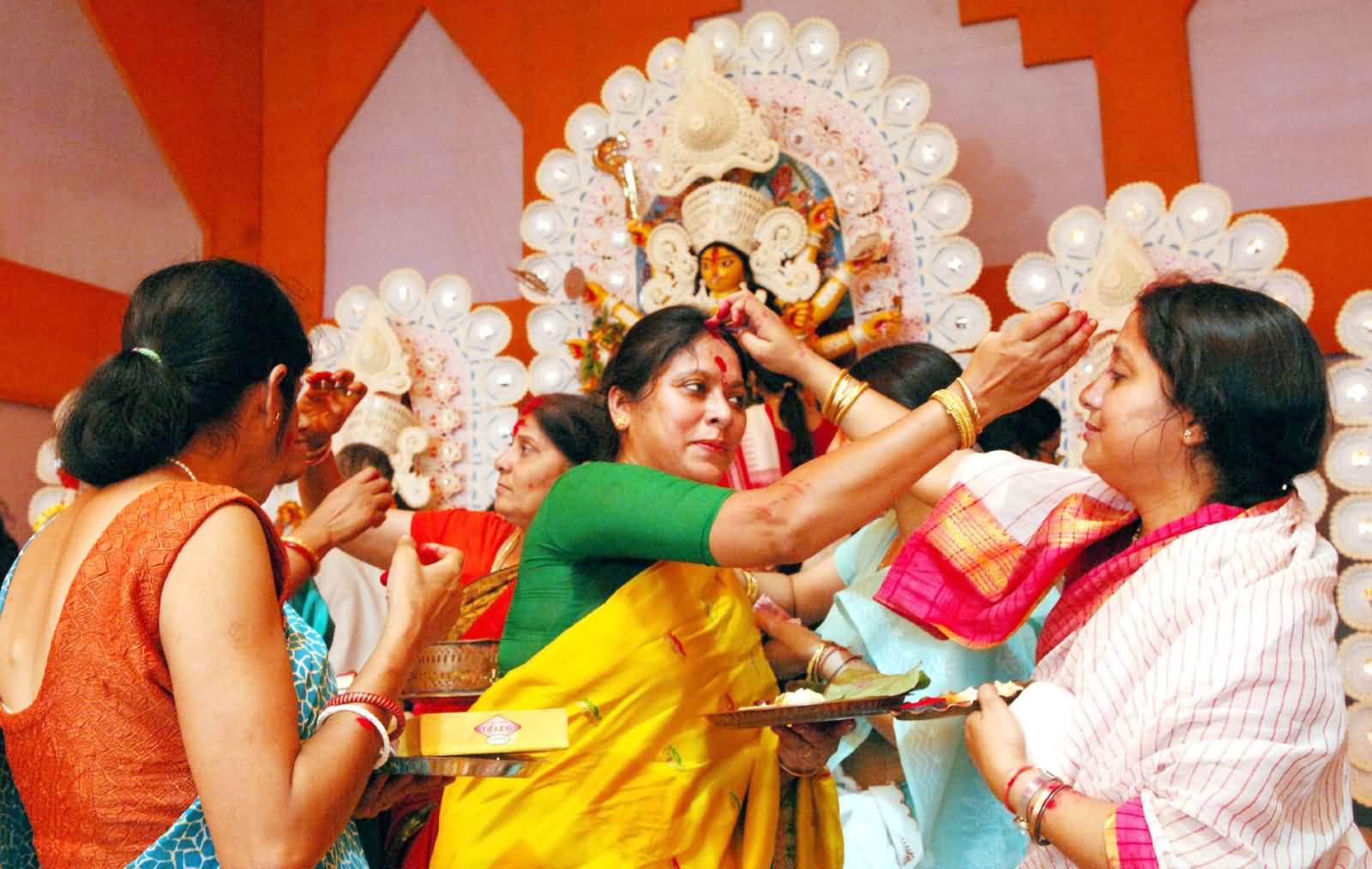 Ladies Celebrating Durga Puja