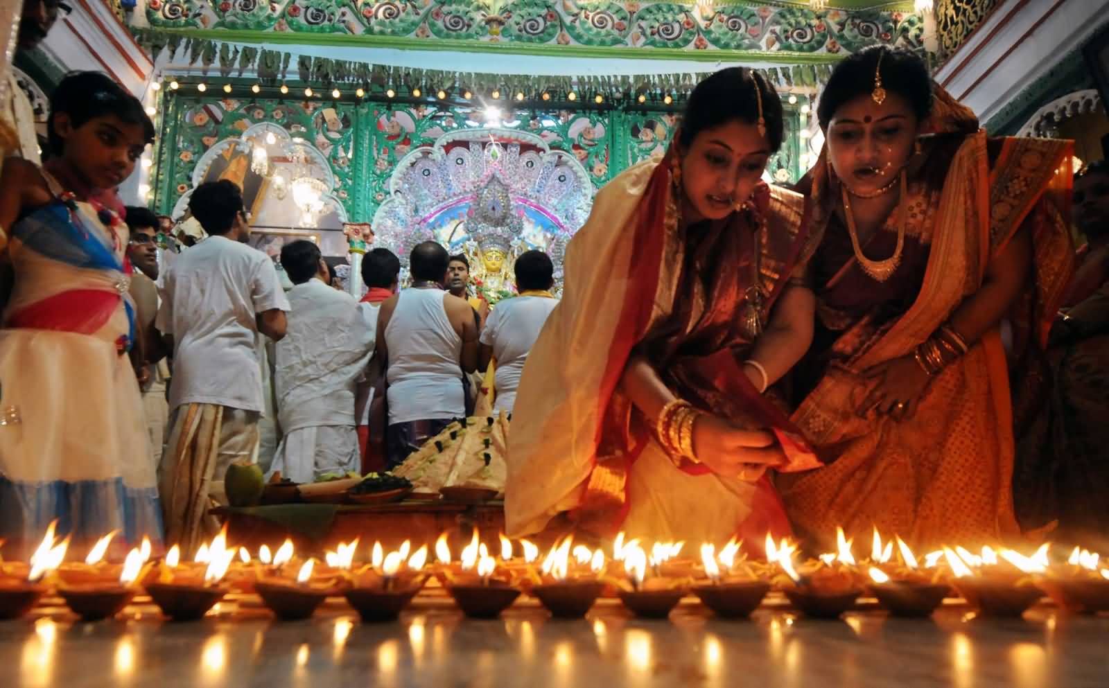 Lighting Diyas Ahead Of Durga Puja Celebrations