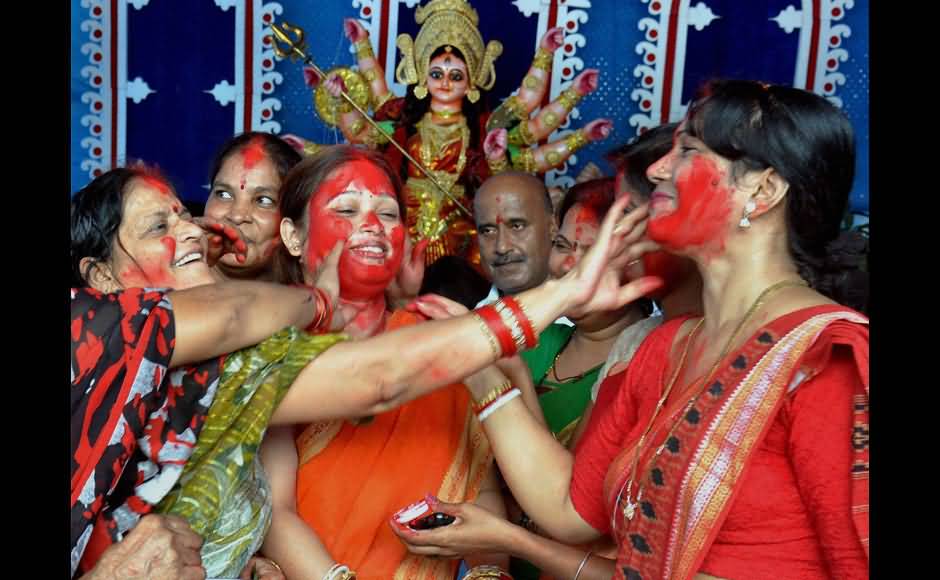 Women Enjoying Sindoor Khela Festival During Durga Puja Celebration