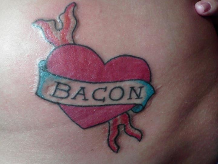 Heart With Bacon Banner Tattoo On Hip