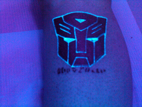 Black Light Autobot Tattoo by Shinigamispet