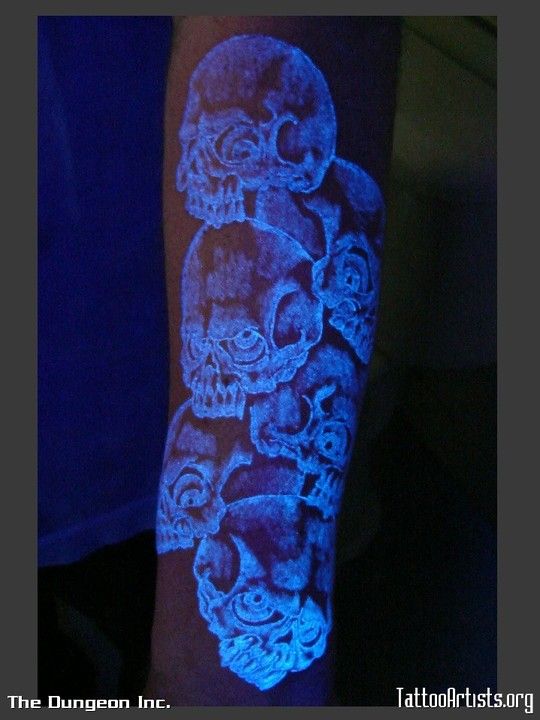 Black Light Skull Tattoos On Left Sleeve