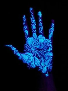 Black Light Tattoo On Left Hand