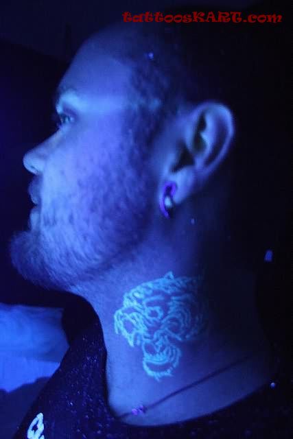 Black Light Tattoo On Side Neck