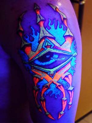 Black Light Tattoos On Left Sleeve