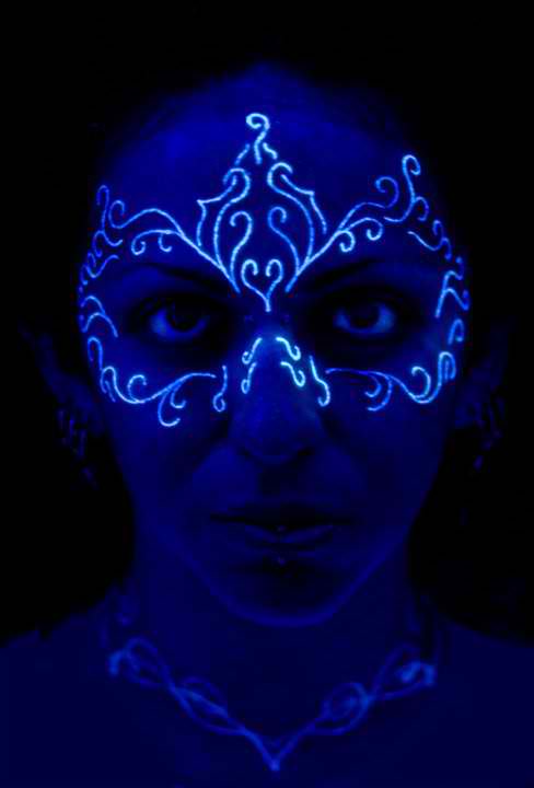 Wonderful Black Light Tattoo On Girl Face