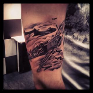 Spitfire Tattoo On Right Bicep by Dr Suave