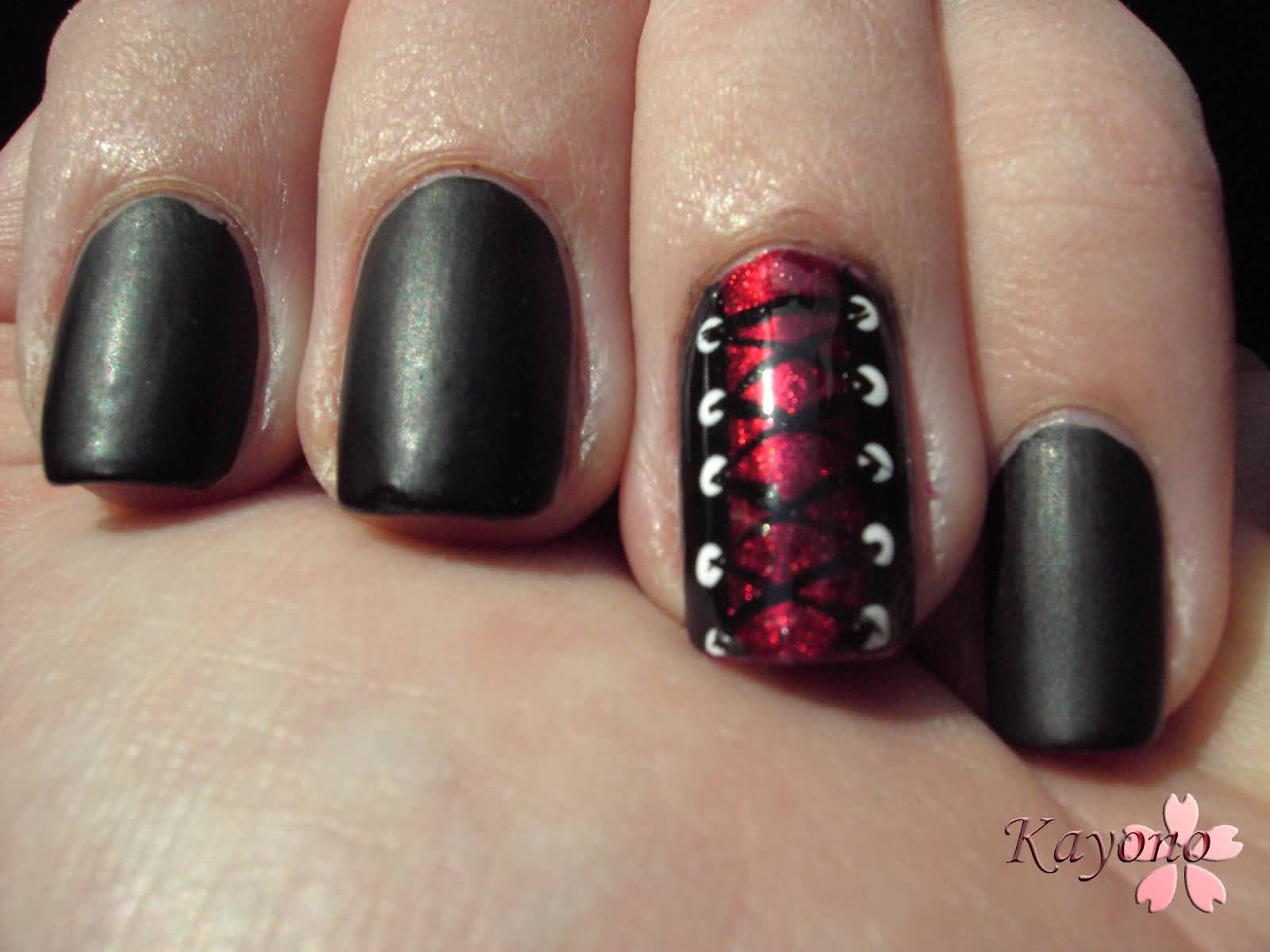 Black Matte Nails With Accent Corset Nail