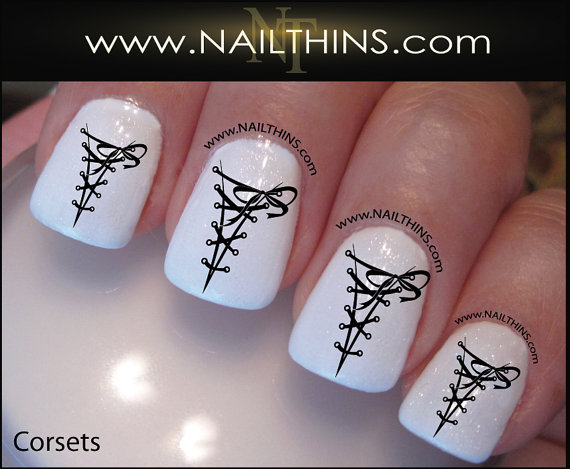 White Base Nails With Beautiful Corset Design Nail