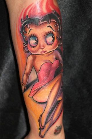 Colorful Betty Boop Tattoo On Arm by Tony Adamson