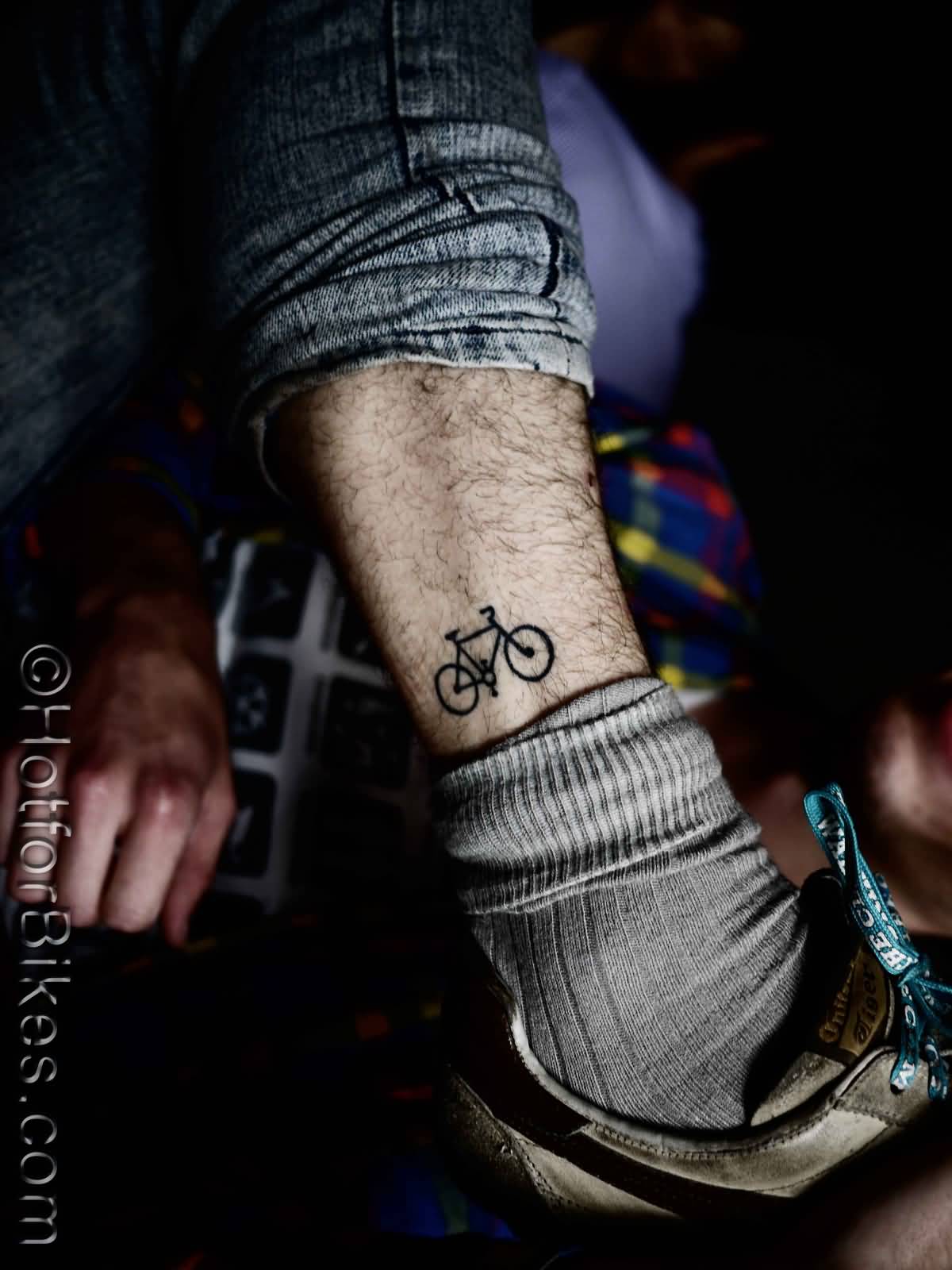 Awesome Black Ink Small Cycle Tattoo On Leg