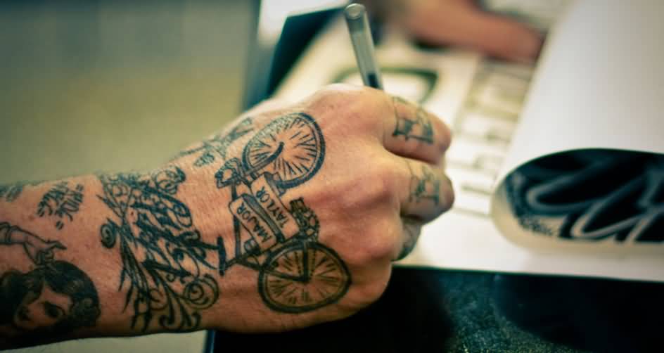 Black And Grey Cycle With Banner Tattoo On Hand