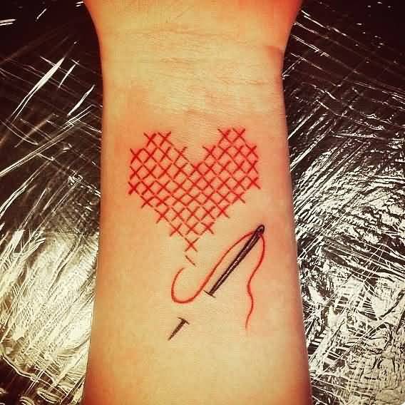 Craft Heart And Needle Thread Tattoo On Wrist