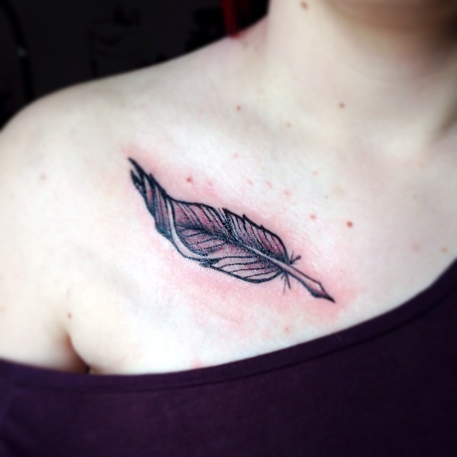 Feather Tattoo On Girl Right Clavicle