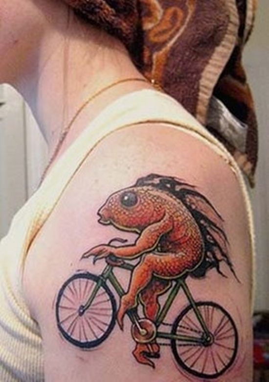 Funny Fish Riding Cycle Tattoo On Left Shoulder