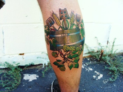 Green Ink Craft Tattoo On Back Leg