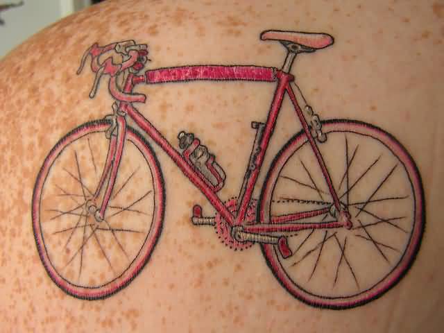 Nice Red Color Cycle Tattoo On Upper Back