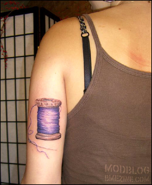 Nice Spool Craft Tattoo On Right Bicep