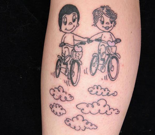 Nice Two Kids Riding Cycle And Clouds Tattoo