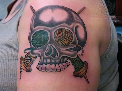 Skull And Spool Craft Tattoo On Left Shoulder