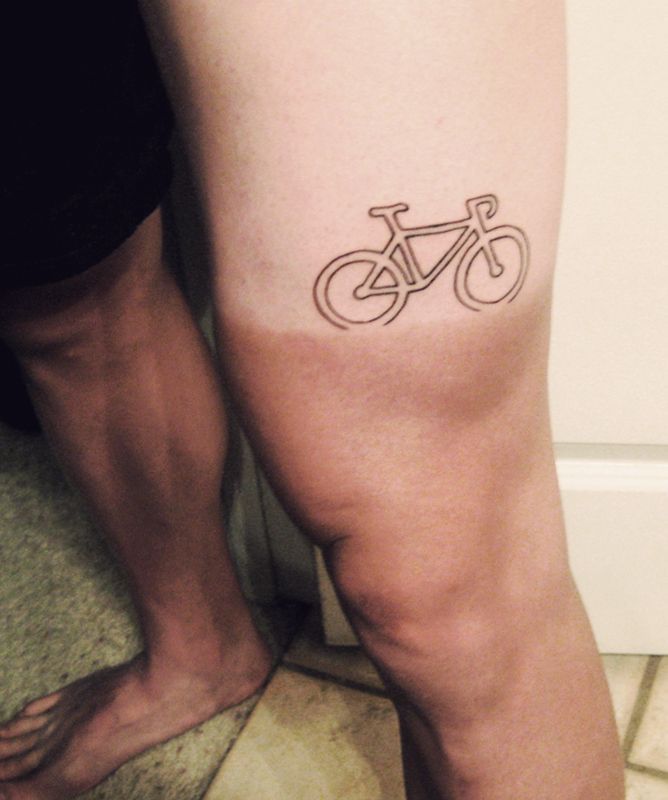 Small Cycle Outline Tattoo On Thigh