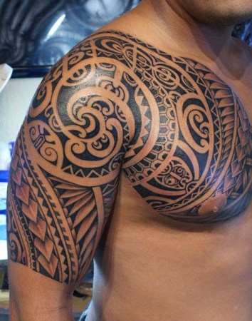 Samoan Tribal Tattoo On Chest And Half Sleeve