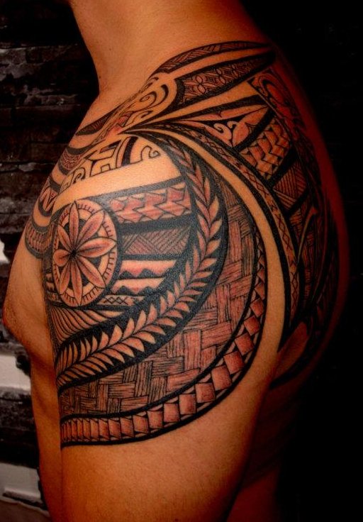 Tiki Samoan Tattoo On Left Shoulder