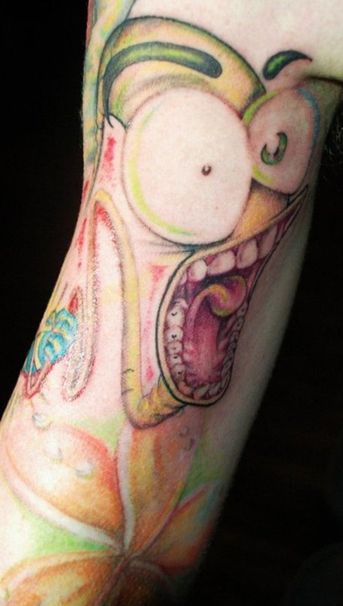 Nice Scared Earthworm Cartoon Tattoo On Sleeve