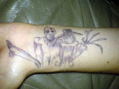 Simple Jason Vs Freddy Tattoo On Wrist