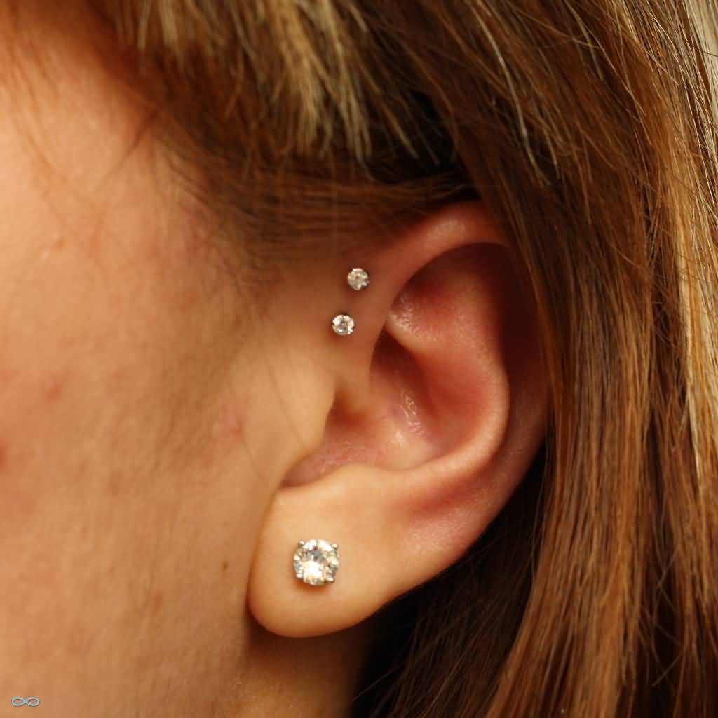 Awesome Left Ear Lobe And Forward Pinna Piercing