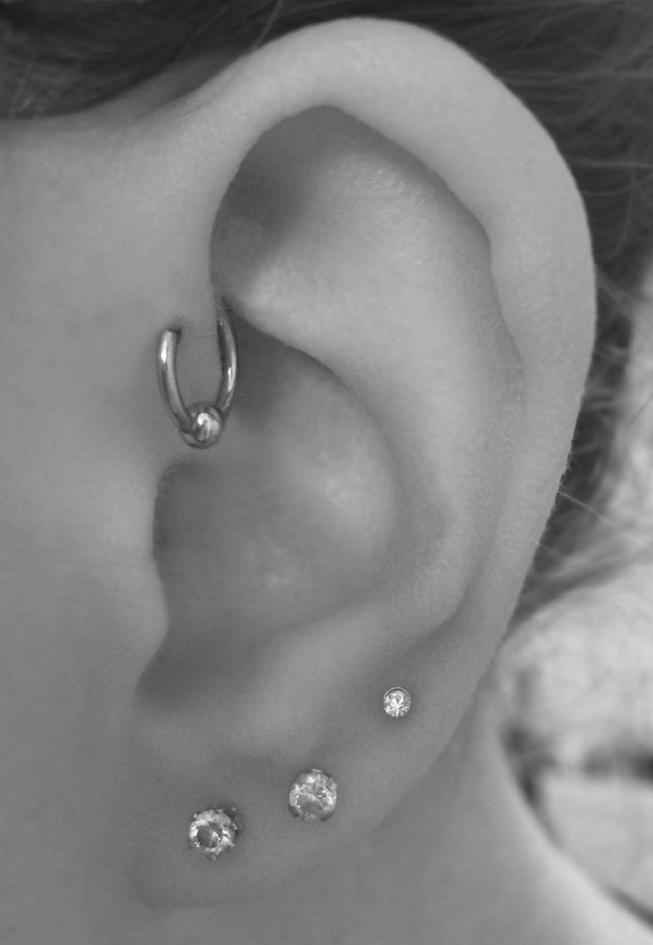 Awesome Triple Lobe And Forward Pinna Piercing With Silver Bead Ring