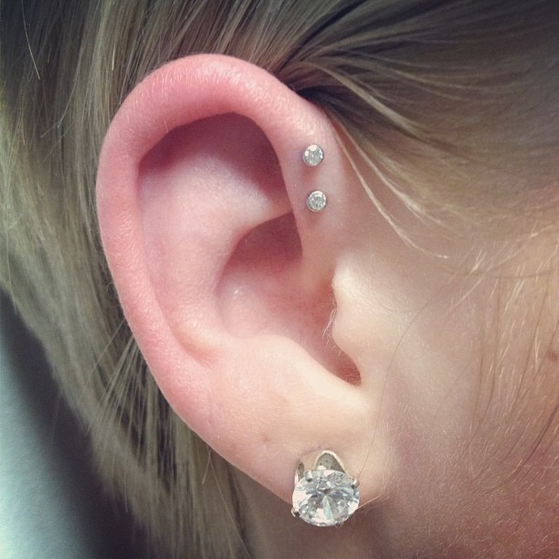 Beautiful Lobe And Forward Pinna Piercing