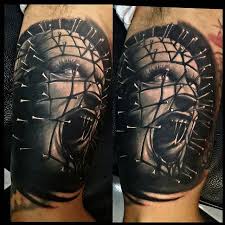 Black Pinhead Face Tattoo By Felix Carmona