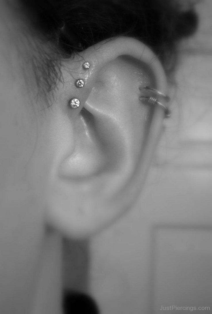 Cartilage And Triple Forward Pinna Piercing