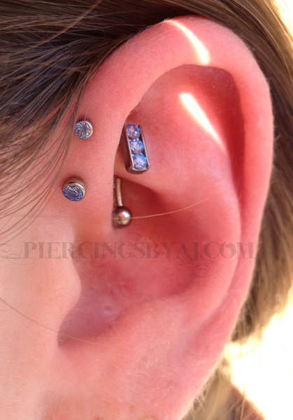 Forward Pinna Piercing With Beautiful Purple Studs