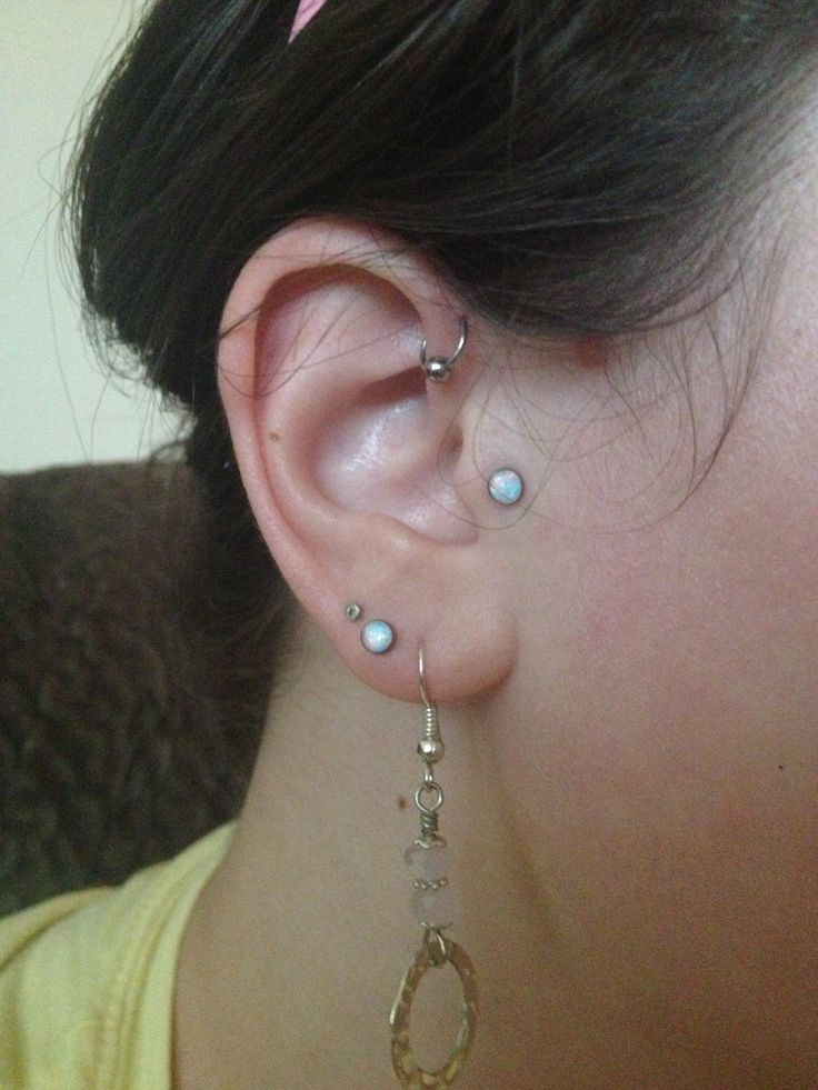 Forward Pinna Piercing With Silver Bead Ring