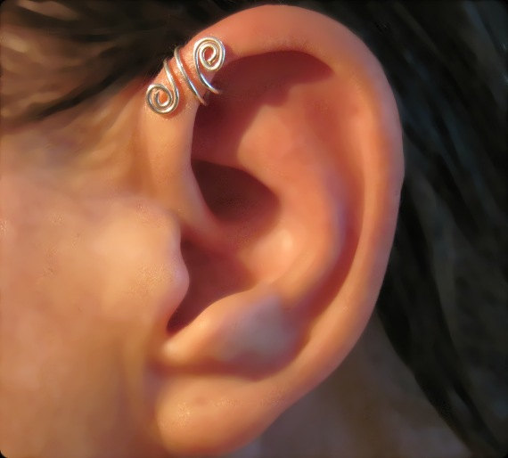 Forward Pinna Piercing With Silver Spiral Cuff