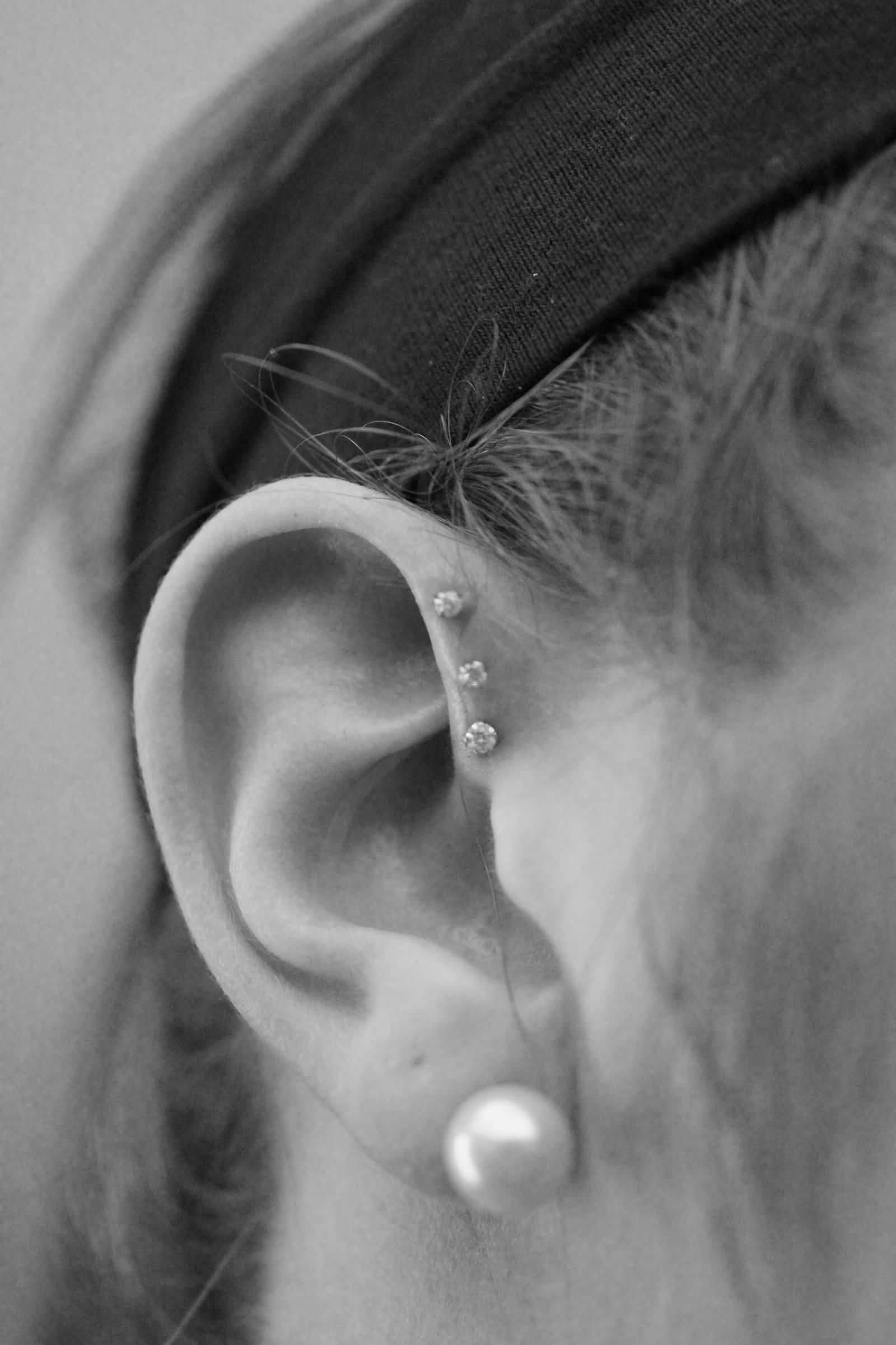 Forward Pinna Piercing With Silver Studs