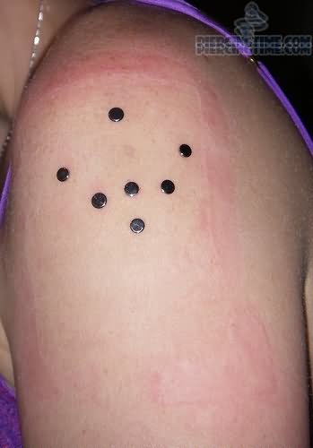 Girl Have Shoulder Piercing With Dermals