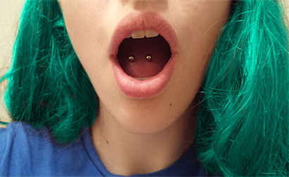 Girl Showing Her Horizontal Piercing