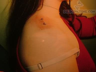 Girl With Surface Shoulder Piercing