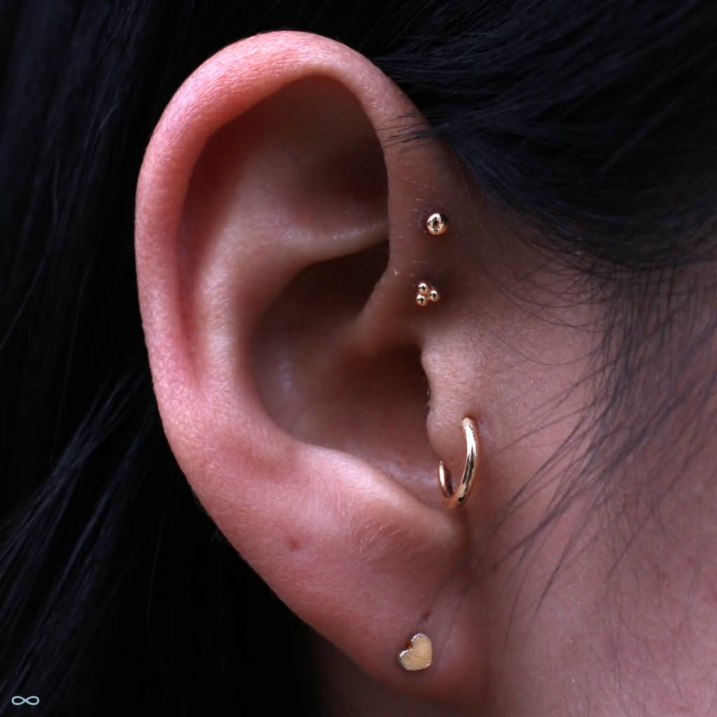 Gold Stud Heart Lobe And Dual Forward Pinna Piercing