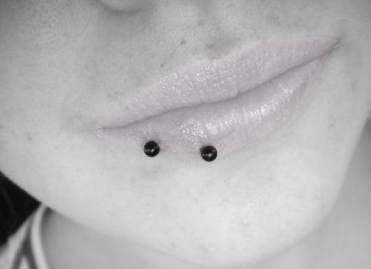 Horizontal Lip Piercing With Black Barbell by Lovetohate666