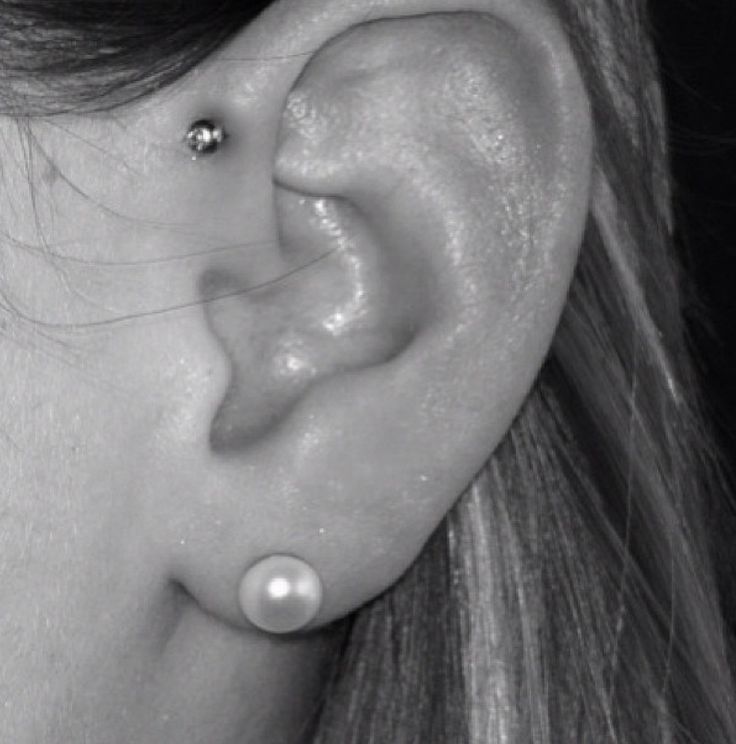 Left Ear Lobe And Forward Pinna Piercing