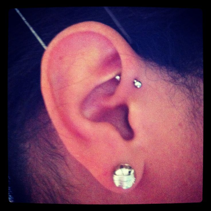 Nice Forward Pinna Piercing With Silver Curved Barbell