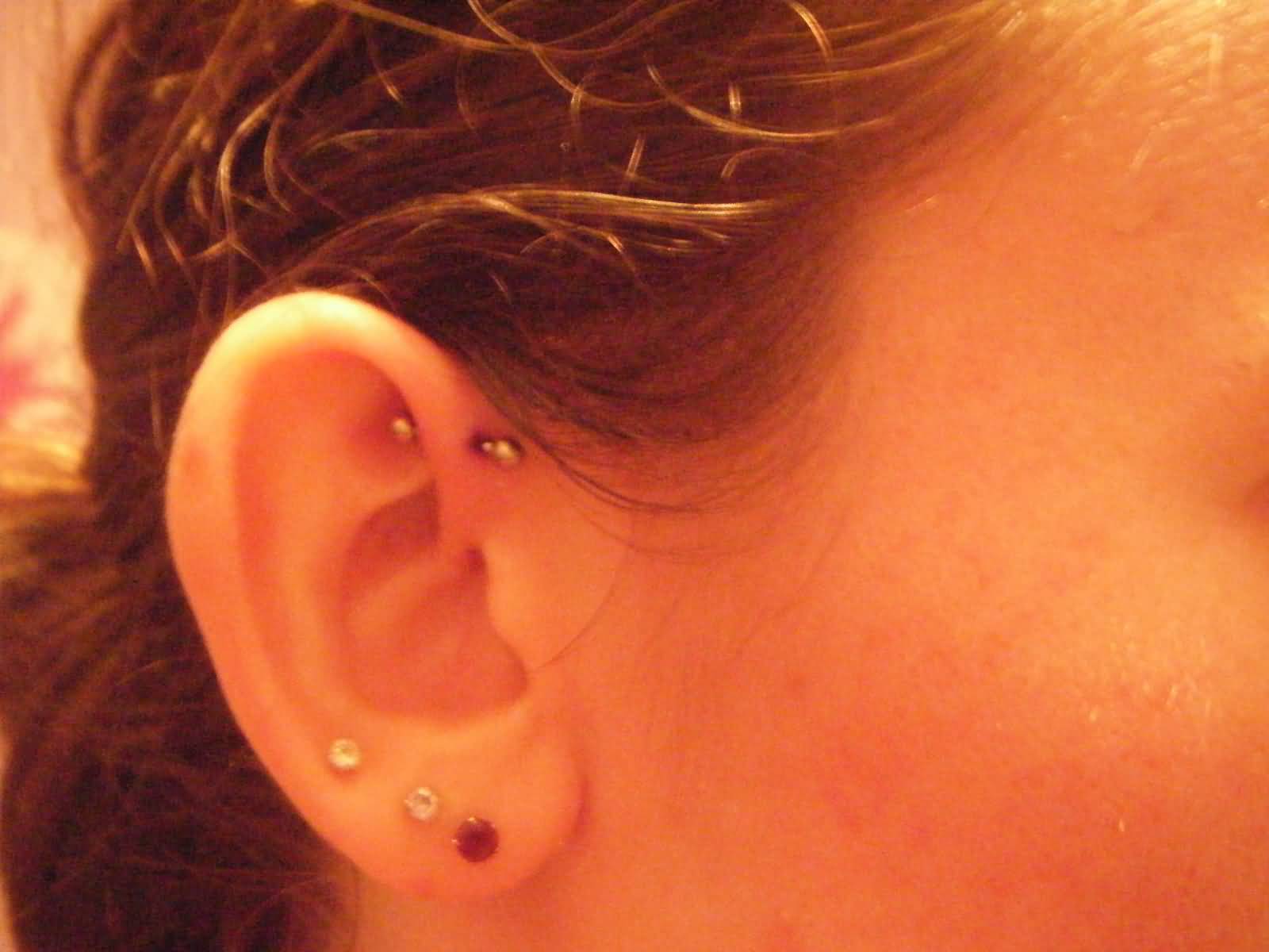 Right Ear Triple Lobe And Forward Pinna Piercing