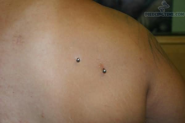 Shoulder Piercing With Surface Barbell