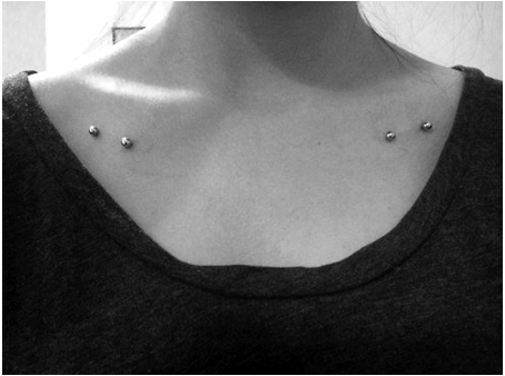 Silver Barbells Shoulder Piercing